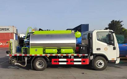 Asphalt spreader for preventive maintenance of highways